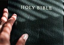 hand-on-bible-01_header_col
